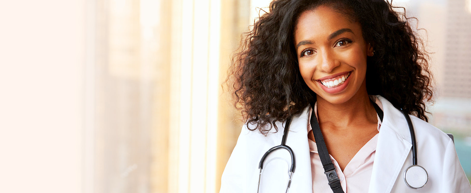 medical personnel smiling at the camera
